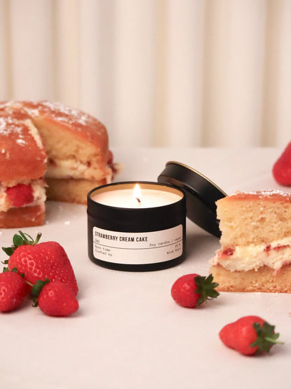 Small candle with strawberry cream cake scent